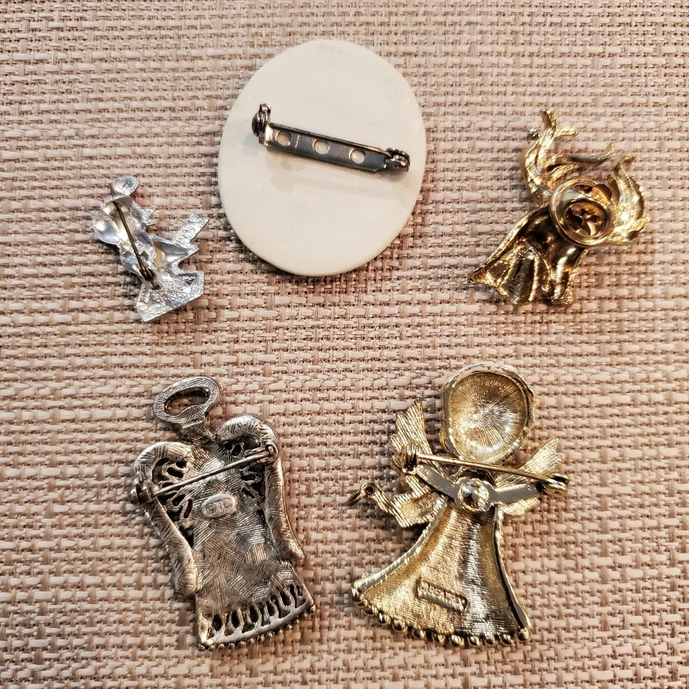 5 vintage Christmas brooches (angels, Rudolph, bird and pine branch)